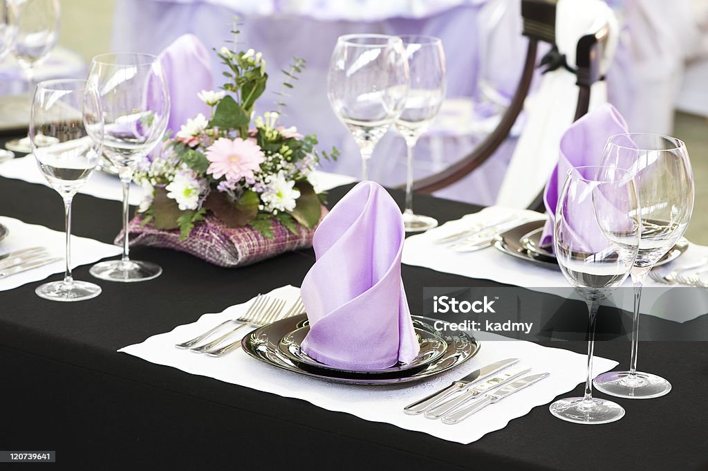 close-up catering table set catering table set service with silverware, napkin and glassware at restaurant Anniversary Stock Photo