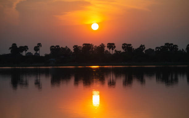 istock Sunset in countryside Thailand 1207396790