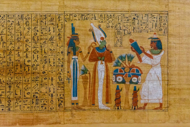 Egyptian ancient papyrus with the different pictures and hieroglyphics stock photo