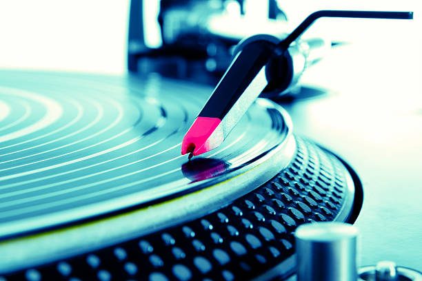 istock Turntable playing vinyl with music 120740055
