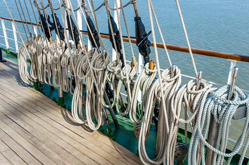 Mast sailing ship against a blue sky