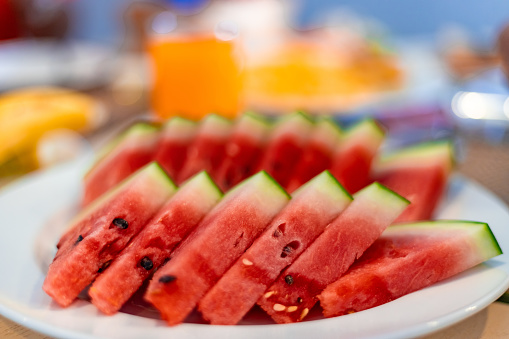 Sliced Watermelon fruits served with breakfast. Healthy breakfast concept.