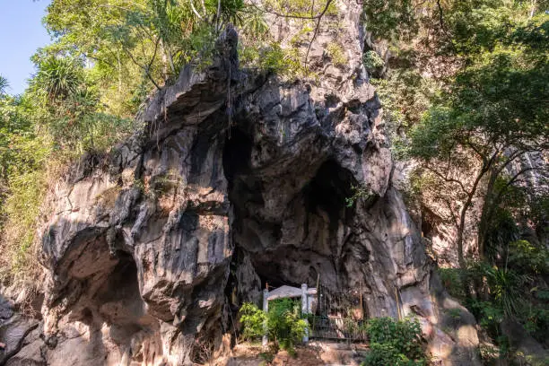 Photo of Wat Tham Phra cave (Buddha cave) an iconic archaeology cave temple with over 80 ancient Buddha images inside.