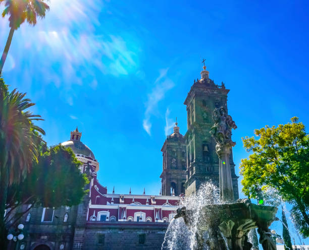 istock Sun Rays Zocalo Park Plaza Cathedral Puebla Mexico 1207422132