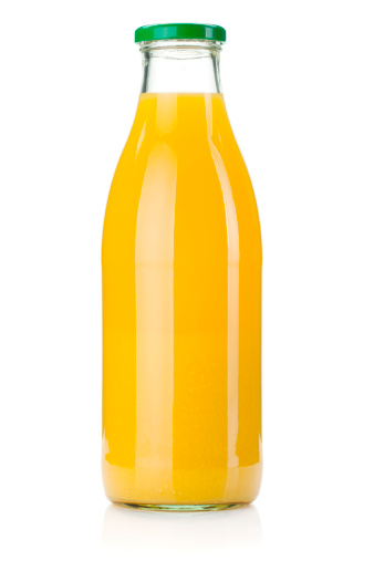 Orange juice glass bottle. Isolated on white background