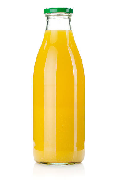 Orange juice Orange juice glass bottle. Isolated on white background non alcoholic beverage photos stock pictures, royalty-free photos & images