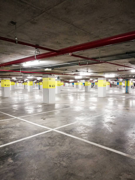 istock Empty space in car parking garage/building. 1207423212
