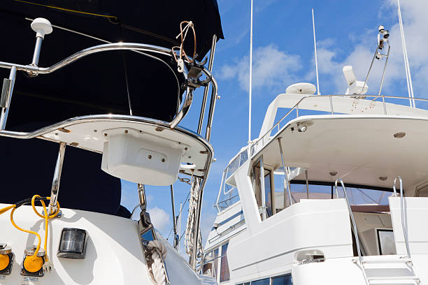 istock Closeup rear view ot two motor yachts 120743080