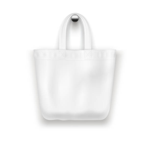 istock Textile   tote  bag hanging on the wall realistic vector  mockup for  shopping design. 1207433554