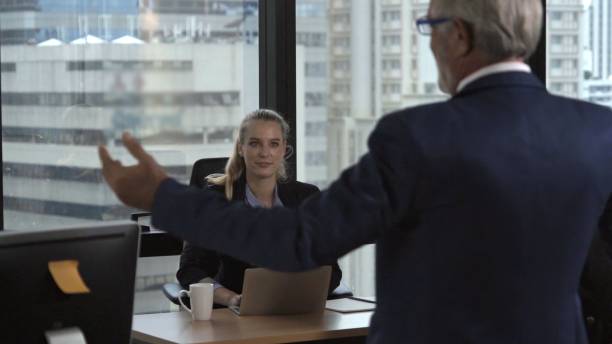 istock Senior leader giving advice speech to team members 1207437795
