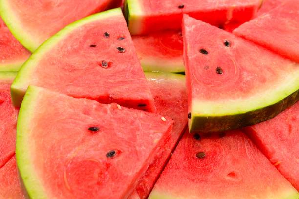 istock Juicy watermelon slices background. Top view. 1207439118