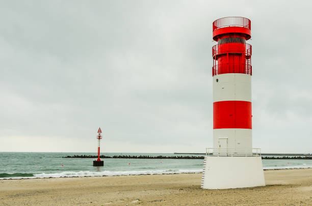 istock Lighthouse on the sanddune of Helgoland, Germany 1207439971