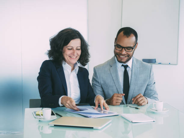 istock Satisfied business partners closing agreement 1207440375