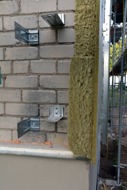 istock Metal angle for fix mineral wool on brick wall 1207440623