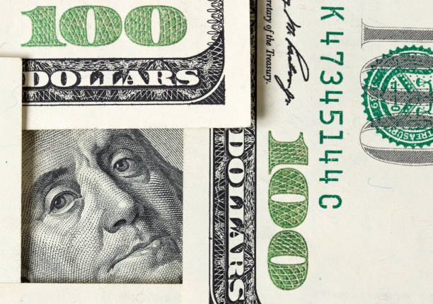 istock Square made of $100 bills with Benjamin Franklin inside 1207441314
