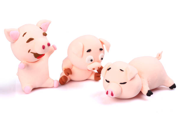 istock Paper clay pig on a white background 1207445031