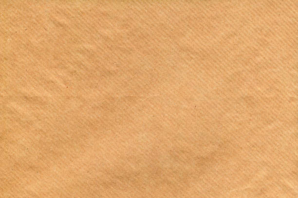 brown paski z recyklingu koperta papieru kraft zmięty tekstury szczegółowo - paper brown paper textured striped zdjęcia i obrazy z banku zdjęć