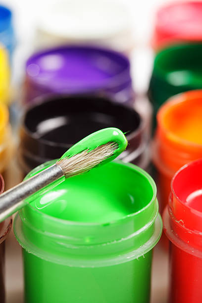 istock Paintbrush in green paint and gouache 120744772