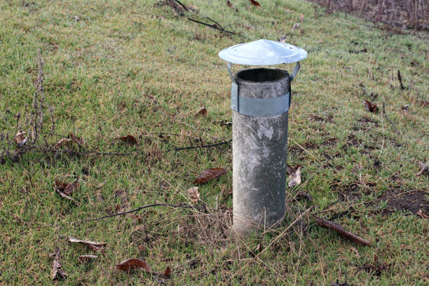 istock Vent pipe sticks out of the ground. 1207447732