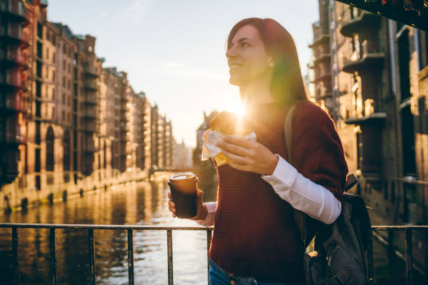 istock Woman exploring Hamburg old town 1207450499
