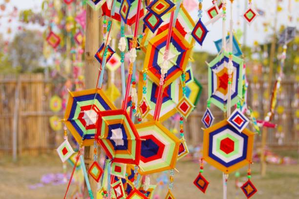 istock Selective focus  colorful  mobile is made of  cotton on blurred  light background , colorful  landscape view  under day light  use for background or wallpaper . 1207453144