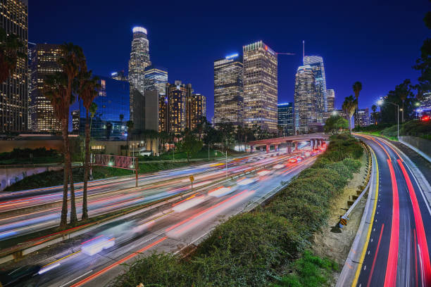 istock Downtown Los Angeles at sunset with light trails 1207458181