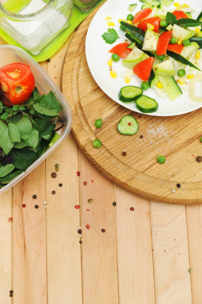 istock Summer salad, cooking at home, top view 1207458605