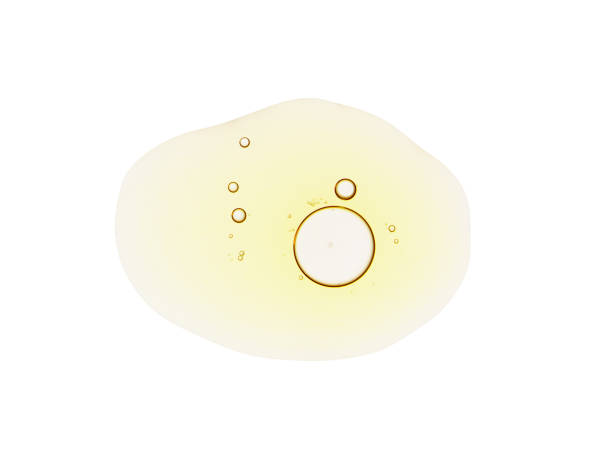 Face serum, yellow essential oil swatch