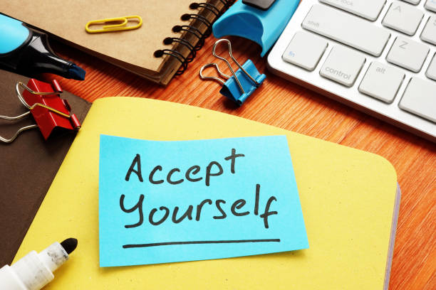 istock Accept yourself words on the memo stick for inspiration. 1207460122