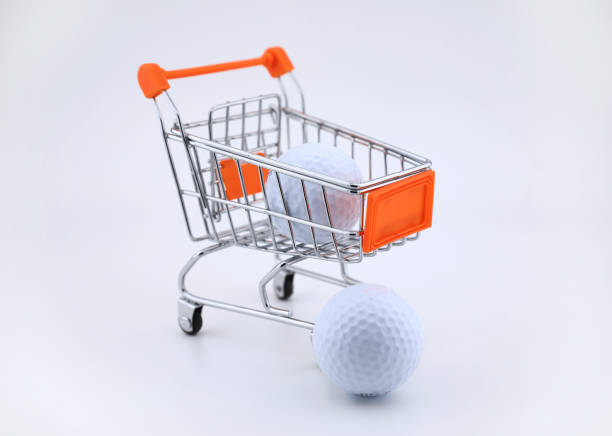 istock Golf balls and shopping trolley 1207461951