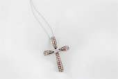 White Gold Cross Pendant With Chocolate Diamonds On Soft White Background