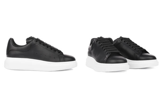 istock Black sport running shoes or sneakers 1207468655
