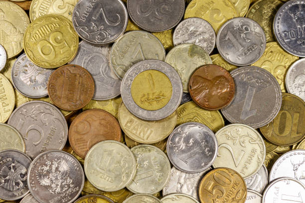 istock Background of various coins from different countries 1207468896