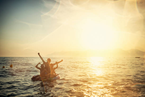 istock Father and kids enjoying summer vacations 1207471773