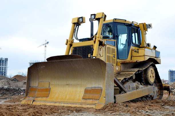 istock Bulldozer during of large construction jobs at building site 1207472911