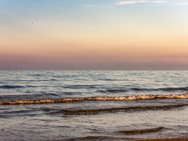 istock Calm sea at sunset 1207472929