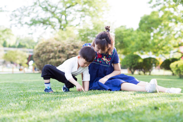 istock young mom and her son, asia, china. 1207476384