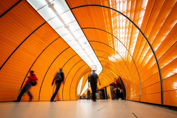 istock people passing pedestrian tunnel 1207476488