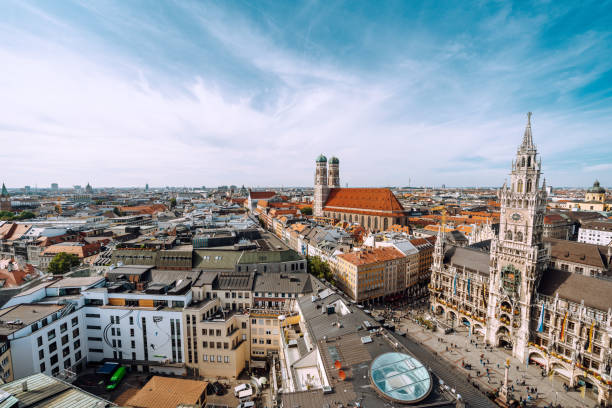 Marienplatz square with New Town Hall and Frauenkirche (Cathedral of Our Lady). Panorama of Marienplatz square with New Town Hall and Frauenkirche (Cathedral of Our Lady). munich city hall stock pictures, royalty-free photos & images