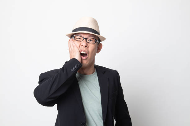 istock adult asian man got toothache. 1207480946