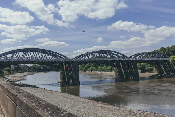 istock Barnes Railway Bridge over the River Thames in London 1207481484