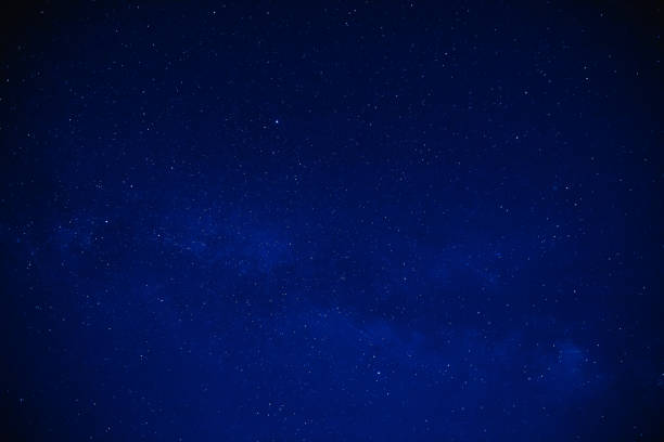 istock Milky way stars on a dark night sky. 1207481707