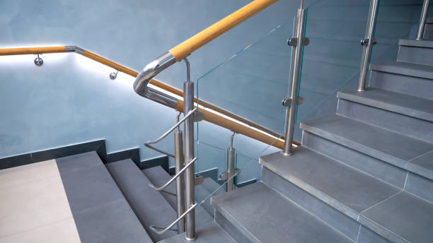 istock Stainless steel, glass and wood railing.Fall Protection. 1207485086
