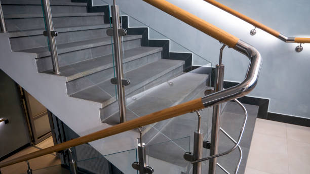 istock Stainless steel, glass and wood railing.Fall Protection. 1207485089