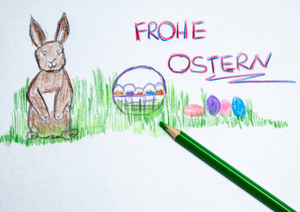 istock Happy Easter painted on a sheet of paper in german 1207486628