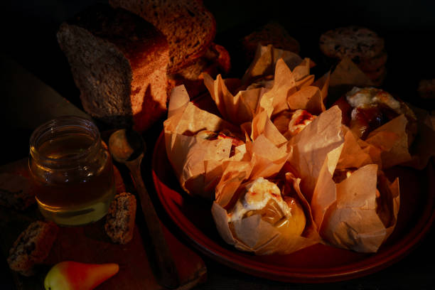istock baked apples in parchment paper 1207488732