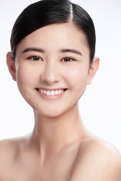 istock Young woman makeup face portrait 1207488875