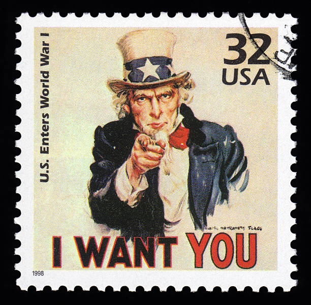 USA Postage Stamp Uncle Sam USA vintage postage stamp showing an image of Uncle Sam from World War One  saying 'I want you' postmark photos stock illustrations