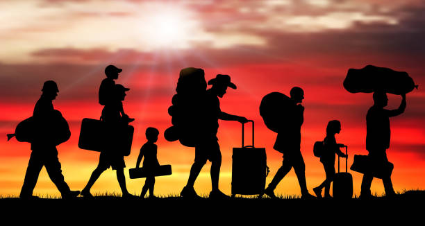 Crowd people migration at sunrise. Silhouette vector illustration (Clipping mask) Crowd people migration at sunrise. Silhouette vector illustration (Clipping mask) crowd of people borders stock illustrations