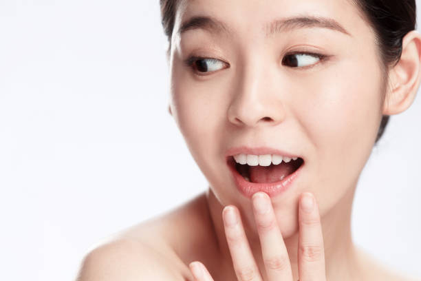 istock Young woman makeup face portrait 1207492775